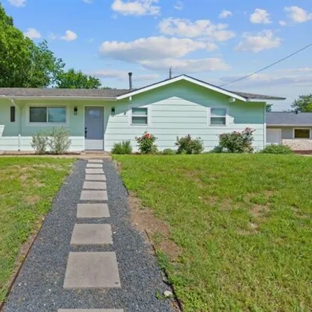 Rent this 3 bed house on 5211 Halmark Dr in Austin, Texas