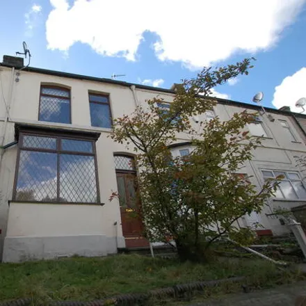 Rent this 3 bed townhouse on Back Albert Road in Farnworth, BL4 7DR