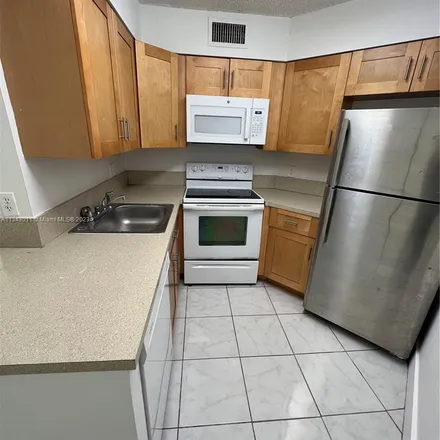 Rent this 2 bed apartment on 231 Lake Pointe Drive in Broward County, FL 33309