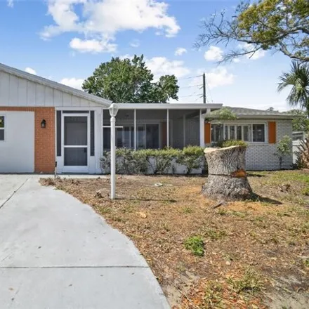 Buy this 3 bed house on 7727 Heather Street in Jasmine Estates, FL 34653