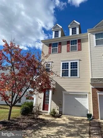 Rent this 4 bed townhouse on Primevere St in Sycamore Hollow, Lexington Park