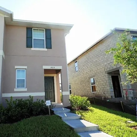 Rent this 4 bed townhouse on 1615 Reflection Cv in Saint Cloud, Florida