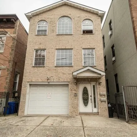 Rent this 3 bed house on 90 Leonard Street in Jersey City, NJ 07307