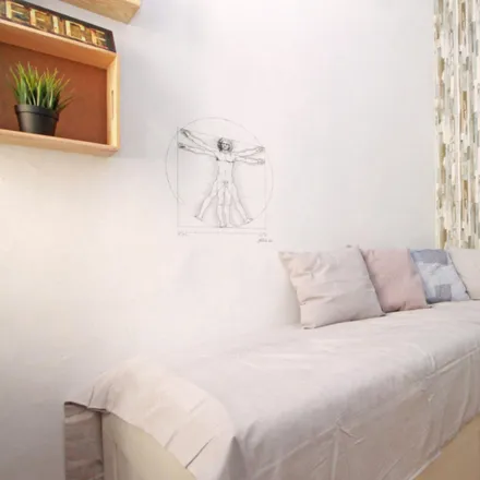 Rent this 3 bed room on Carrer de la Riera de Sant Miquel in 08001 Barcelona, Spain