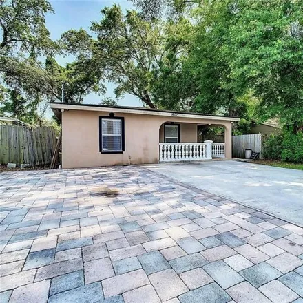 Buy this 4 bed house on 1606 East Louisiana Avenue in Tampa, FL 33610