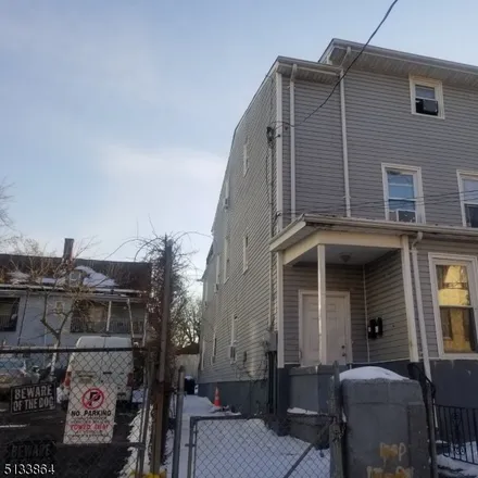 Buy this 9 bed townhouse on 114 Warren Street in Paterson, NJ 07524