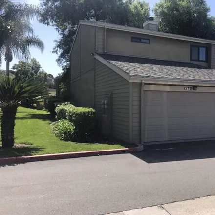 Rent this 3 bed house on 280 Durian Street in Vista, CA 92056