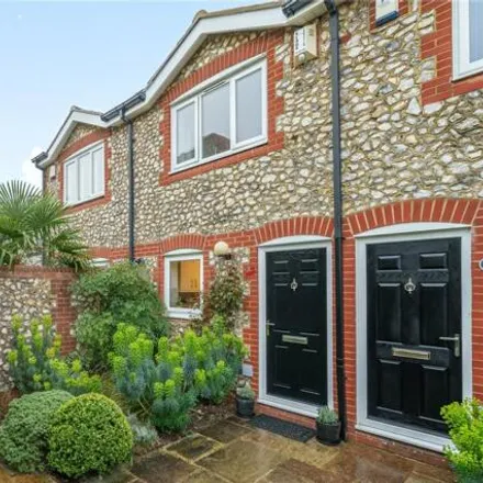 Buy this 2 bed townhouse on Harvest Lane in Elmbridge, KT7 0NG