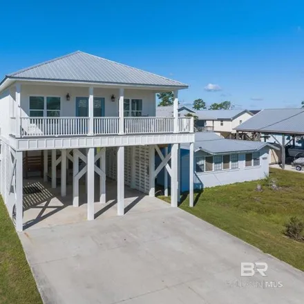 Buy this 5 bed house on 5615 Bayou St John Avenue in Orange Beach, AL 36561