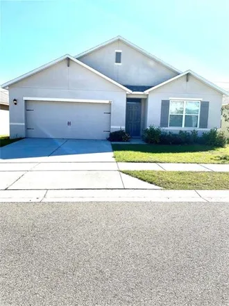 Rent this 4 bed house on Bella Drive in Polk County, FL 33836