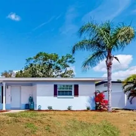 Buy this 4 bed house on 2776 Kumquat Drive in Clearwater, FL 33759