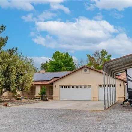 Buy this 4 bed house on 3501 Unicorn Avenue in Pahrump, NV 89048