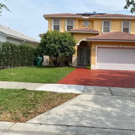 Buy this 4 bed house on 8767 Northwest 139th Terrace in Miami Lakes, FL 33018