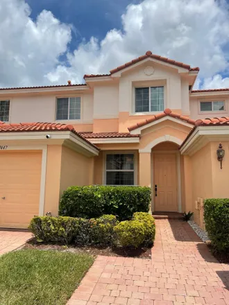 Rent this 3 bed townhouse on 7444 Briella Drive in Palm Beach County, FL 33437