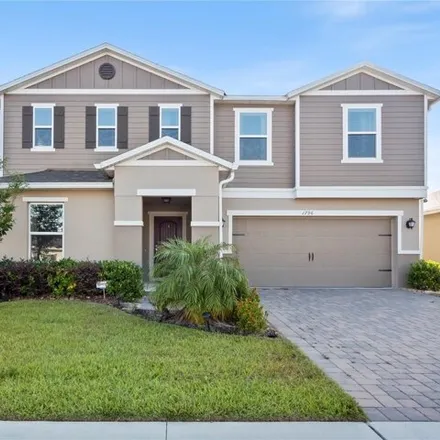 Buy this 4 bed house on 1796 Wilson Prairie Circle in Groveland, FL 34715