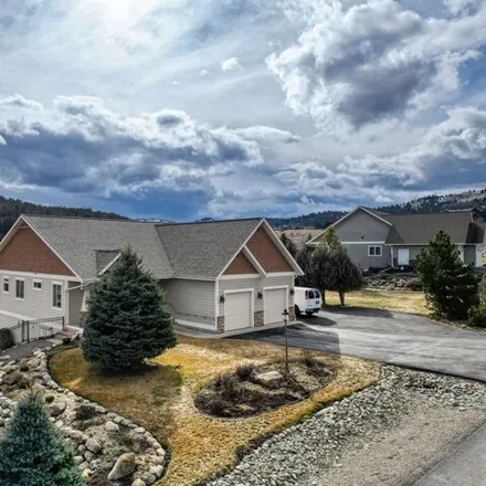 Buy this 4 bed house on 613 Stoneridge Drive in Flathead County, MT 59901
