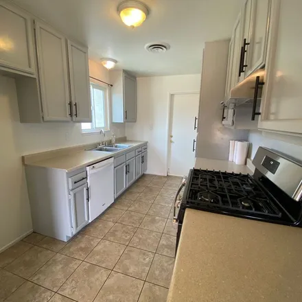 Rent this 4 bed apartment on 1121 Dianron Road in Palmdale, CA 93551