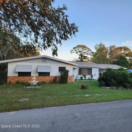 Rent this 3 bed house on 285 Mantor Avenue South in Titusville, FL 32796