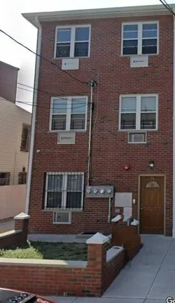 Buy this 8 bed house on 25 Cox Pl in Brooklyn, New York