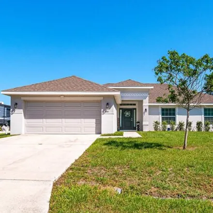 Buy this 4 bed house on 2072 Southwest Grape Court in Port Saint Lucie, FL 34953