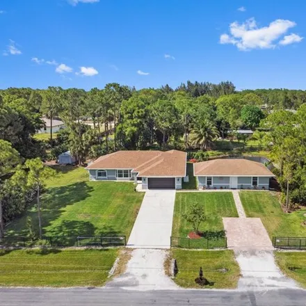 Buy this 6 bed house on 12731 61st Street North in Palm Beach County, FL 33412