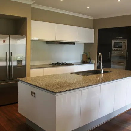 Rent this 4 bed apartment on Mowbray Drive in Point Cook VIC 3030, Australia