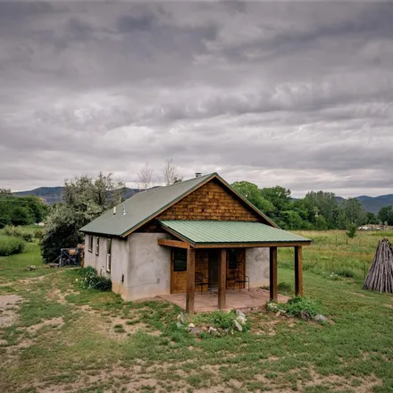 Buy this 2 bed house on 124 Upper Ranchitos Road in Taos, NM 87571