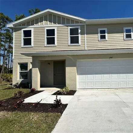 Rent this 4 bed house on 1264 Autumn Street in Port Charlotte, FL 33980