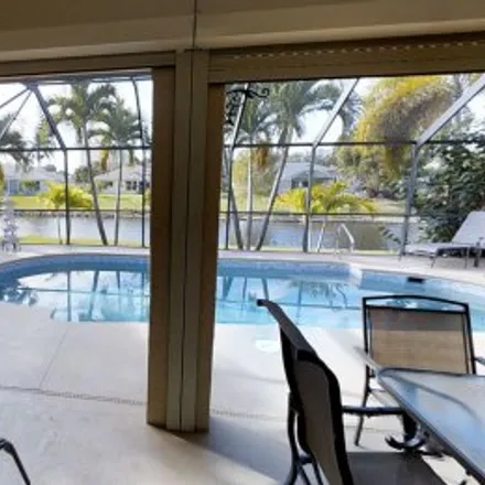 Rent this 3 bed apartment on 1054 Southwest 57Th Street in Rose Garden, Cape Coral