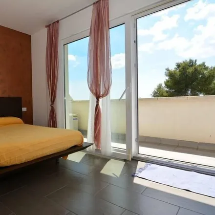 Rent this 4 bed townhouse on 43883 Roda de Berà