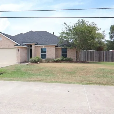 Rent this 4 bed house on 5304 Westchase Loop in Hardin County, TX 77657