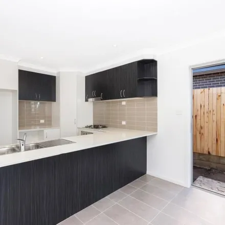 Rent this 3 bed apartment on Australian Capital Territory in Rockwood Street, Casey 2913