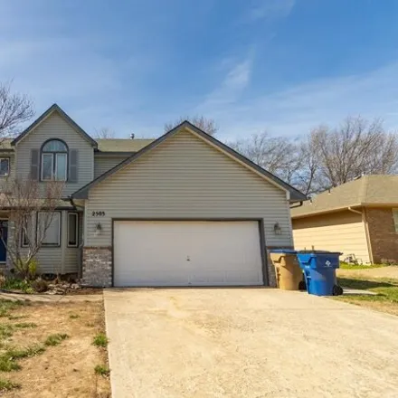 Buy this 5 bed house on 2499 North Button Bush Circle in Derby, KS 67037