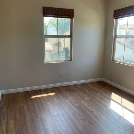 Rent this 3 bed apartment on 6085 Roselle Meadows Trail in San Diego, CA 92130