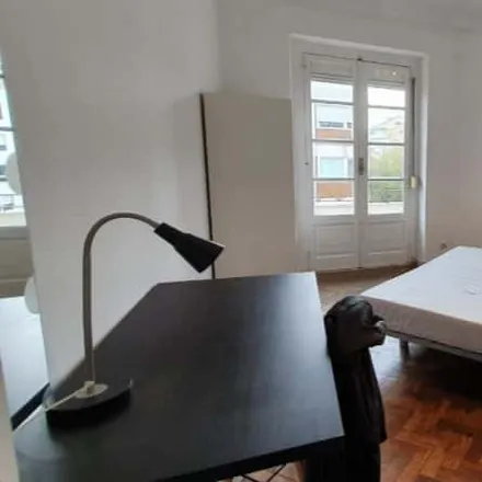 Rent this 7 bed room on Rua José Estevão 24 in 1150-192 Lisbon, Portugal