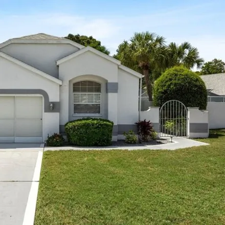 Buy this 2 bed house on 11032 Via de Rosa Lane in Spring Hill, FL 34608