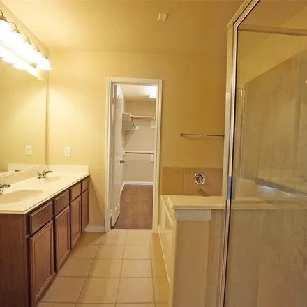 Rent this 3 bed apartment on 24300 Silent Flight Drive in Harris County, TX 77494