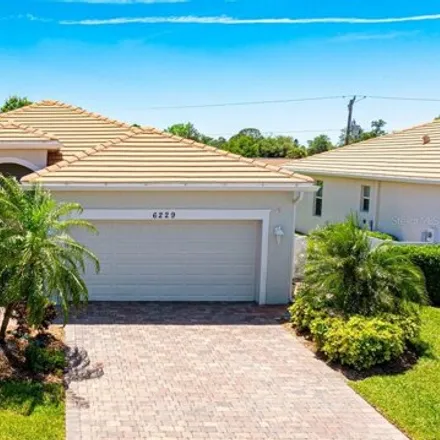 Buy this 4 bed house on 6196 Grand Cypress Boulevard in North Port, FL 34287