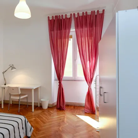 Rent this 8 bed room on Via Alberto Caroncini in 00197 Rome RM, Italy