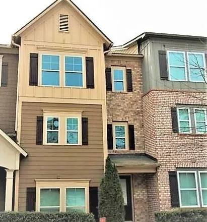 Rent this 3 bed townhouse on 4300 Peachtree Industrial Boulevard in Peachtree Corners, GA 30071