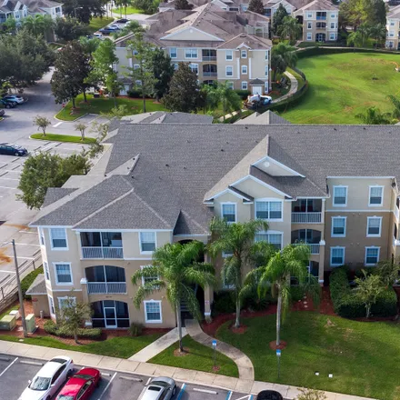 Rent this 2 bed apartment on 2354 Butterfly Palm Way in Osceola County, FL 34747