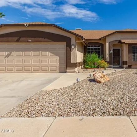 Buy this 4 bed house on 4208 West Whispering Wind Drive in Glendale, AZ 85310