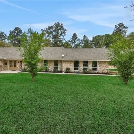 Buy this 4 bed house on 3115 Corrolla in Montgomery County, TX 77356
