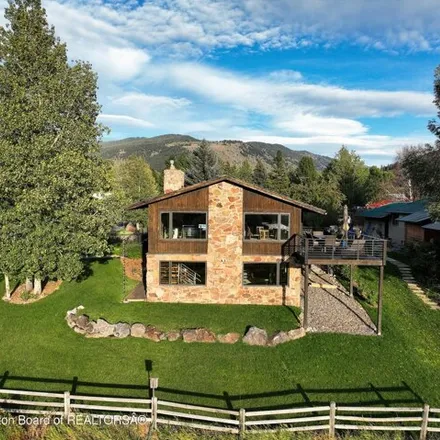 Buy this 4 bed house on 520 W Kelly Ave in Jackson, Wyoming