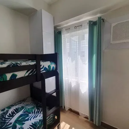 Rent this 2 bed condo on Quezon City in Eastern Manila District, Philippines