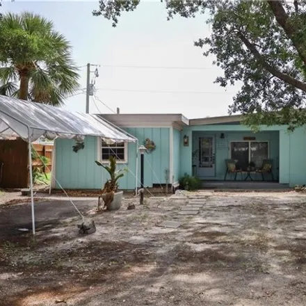 Buy this 3 bed house on 1801 Northeast 23rd Avenue in Jensen Beach, FL 34957