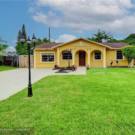 Buy this 6 bed house on 2150 Northeast 2nd Terrace in Kendall Green, Pompano Beach