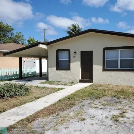 Buy this 3 bed house on 3087 Northwest 3rd Street in Collier Park, Pompano Beach