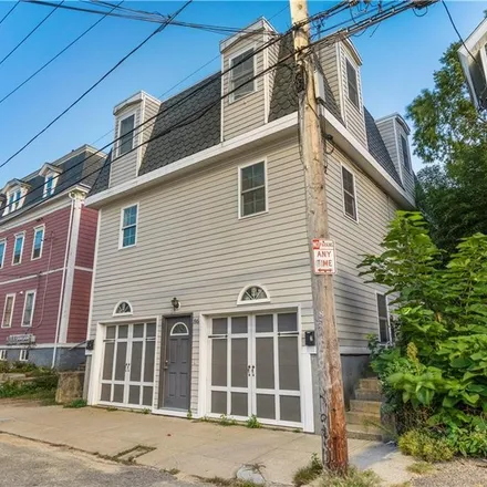 Buy this 4 bed townhouse on 86 Grove Street in Olneyville, Providence
