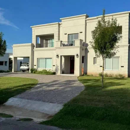 Buy this 4 bed house on unnamed road in Partido de Luján, 6700 Luján